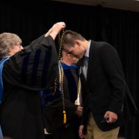 Student receiving cords